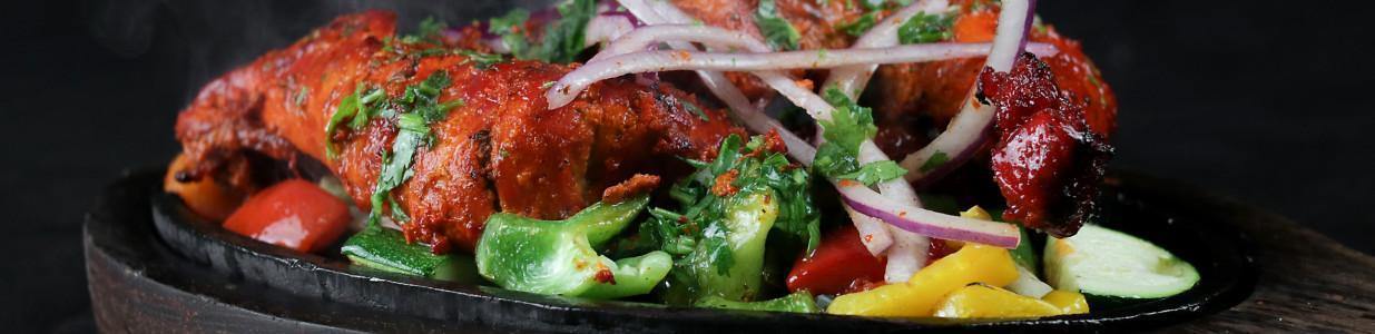 Moghel Tandoori Cover Image